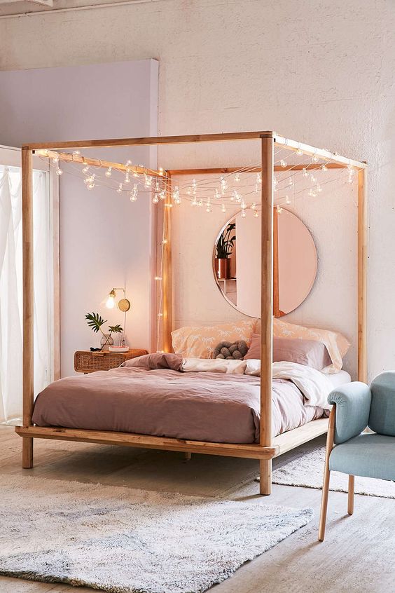 hang string lights on the bed frame to make falling asleep cuter