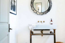 09 A guest bathroom features chic industrial touches – avanity and a mirror were custom-made