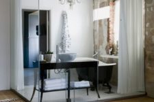 09 an elegant bathroom that can be hidden behind the curtains for privacy