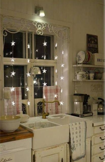 cute star string lights as window decor are great not only for winter holidays but all year round