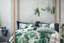 09 greenery bedding set and some herbs hanging on the bed frame for a fresh spring look