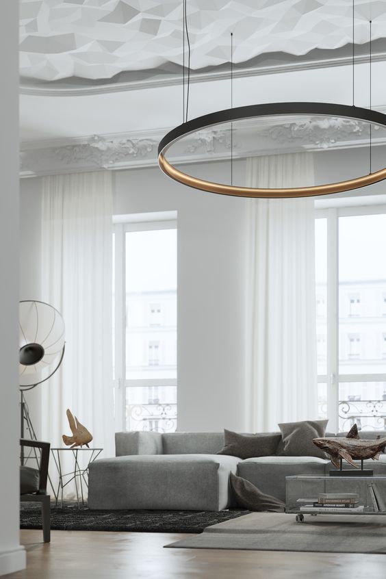 an oversized hoop modern chandelier makes a real statement in the space