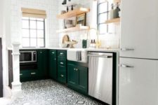 10 the kitchen is made more eye-catching with black and white patterned tiles on the floor