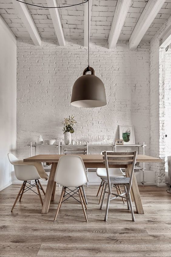 get more interest using exposed white brick walls and exposed wooden beams in your space