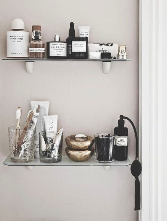 small open bathroom shelves of glass are a very elegant choice besides they won't take much space
