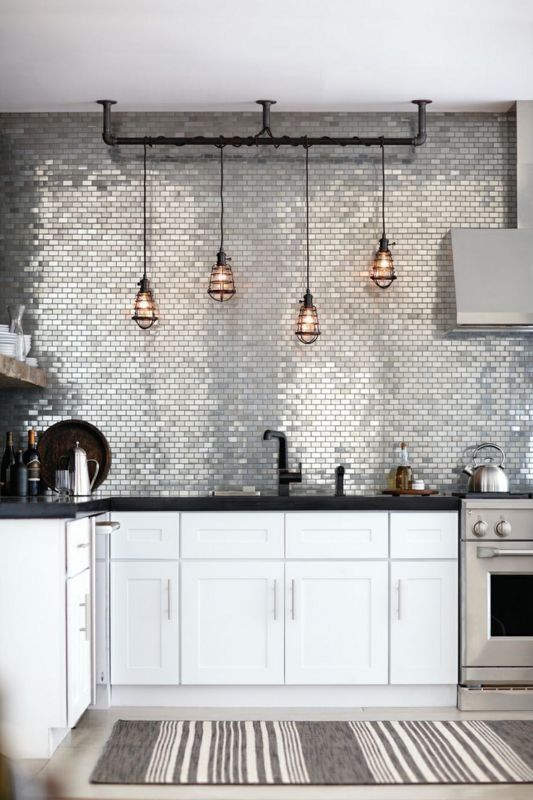glossy silver tiles covering the whole wall are just jaw-dropping