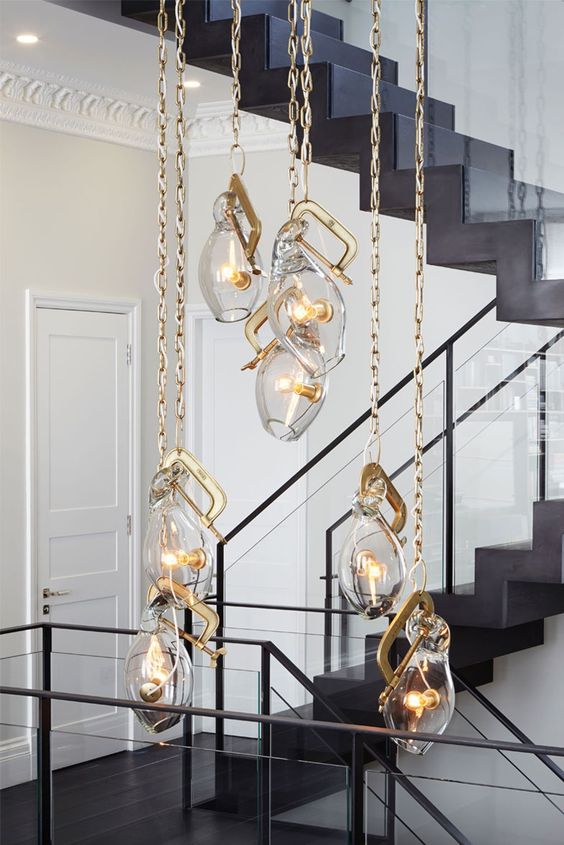 highlight the tall ceilings with such unique pendant lamps on chains