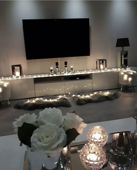 highlight your TV zone with string lights and maybe candles, this is a great way to accent