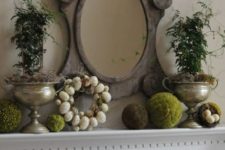 18 an egg wreath, moss balls and potted greenery plus a vintage mirror for a vintage space