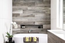 19 a contemporary bathroom with reclaimed wood touches and negative space for a comfy feel