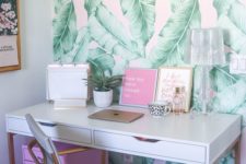 19 a girlish home office accented with printed torpical leaf wallpaper