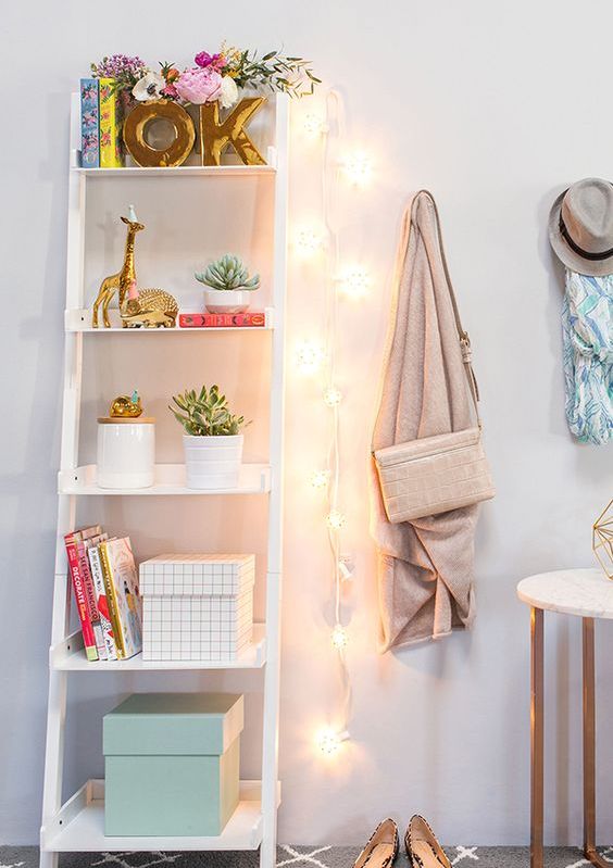 a string of lights hanging on the wall will substitute a lamp