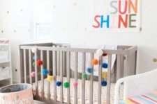 20 add touches of color to your gender neutral nursery with bright upholstery, a colorful pompom garland and a sign