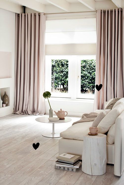 blush curtains add color to this neutral space and make it softer and more girlish