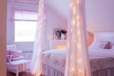 20 string lights attached to the fabric curtains for a cool look and to highlight the sleeping space