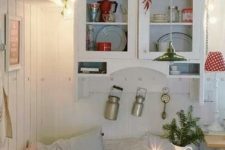 20 string lights over the cabinet are great for holiday and all-year-round decor