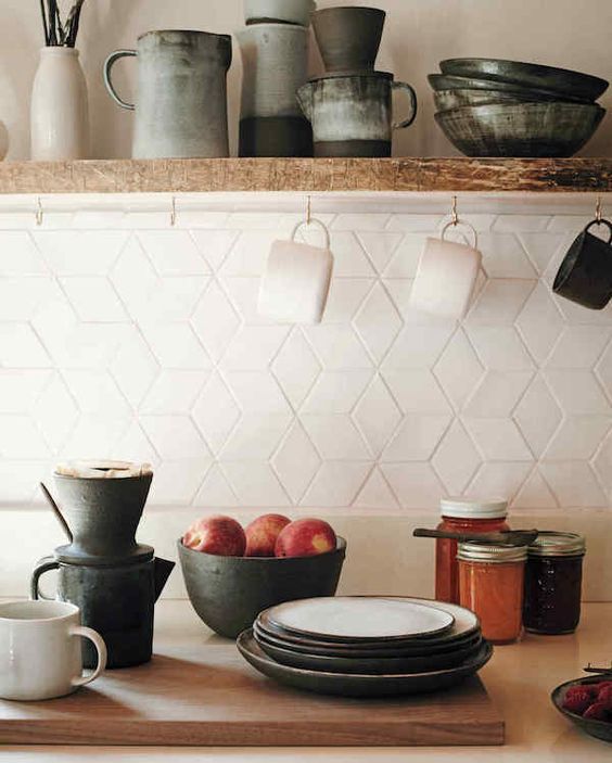 Eye catchy geometric tiles on the kitchen backsplash look chic and interesting