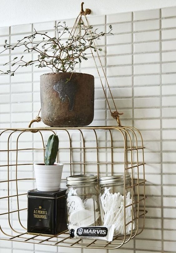a stylish metal bathroom organizer to hang wherever you want