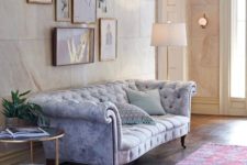 23 a watercolor grey and blue Chesterfield with exquisite legs and armrests