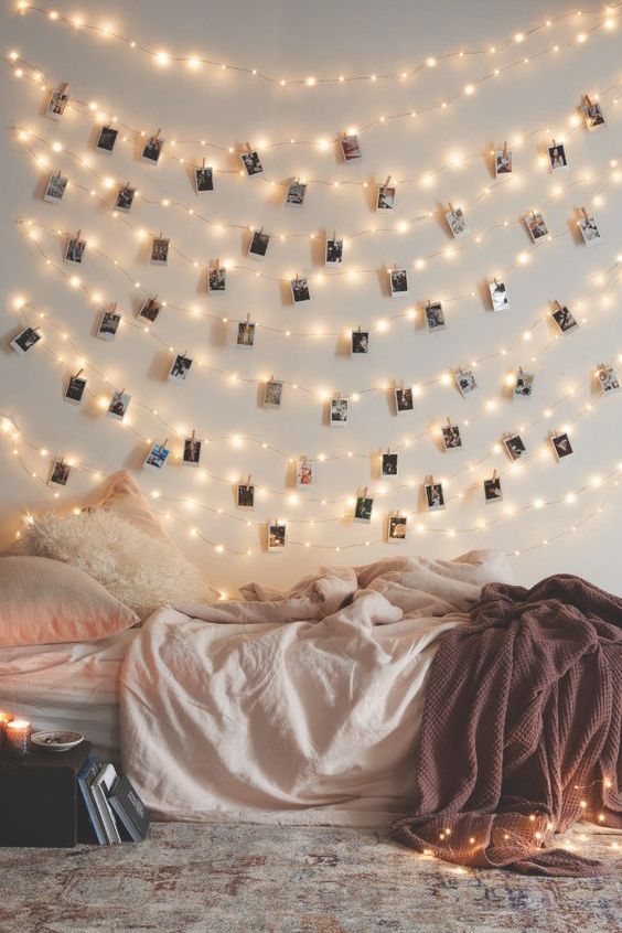 string lights with Polaroids are only lights, they are also a nice idea of decor