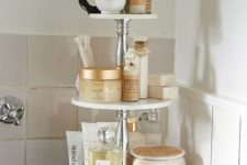 24 a chic rounded etagere as an elegant bathroom organizer