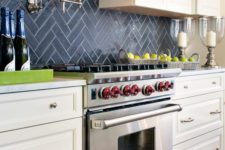 25 navy chevron tile backsplash stands out in a neutral farmhouse kitchen