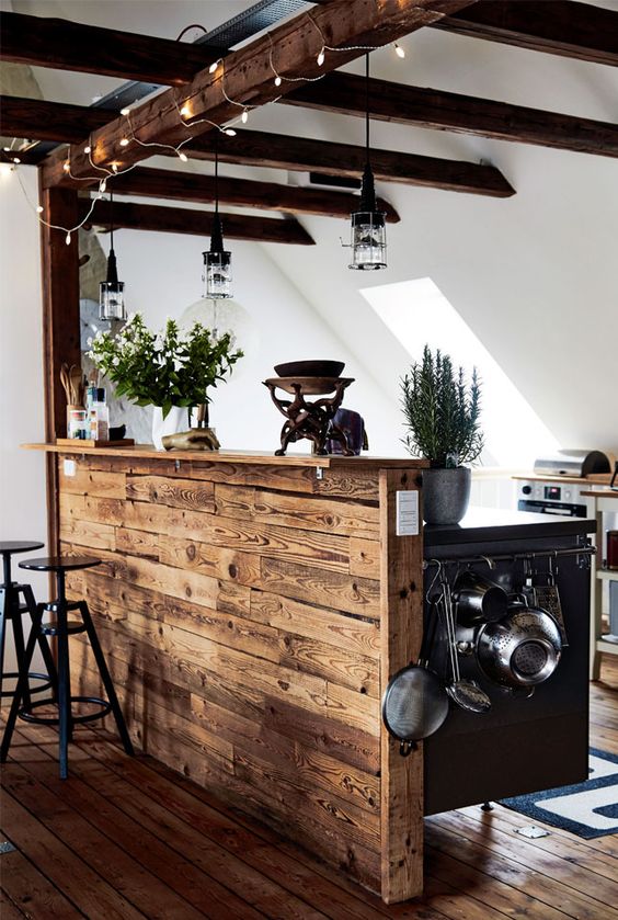 highlight your exposed beams with string lights to make the space more cheerful