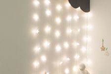 star-shaped string lights fro a cloud in the corner of the room where the storage is