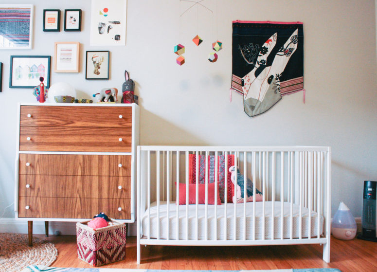 IKEA's crib looks minimalist so it fits in a nursery of any style. Even in a mid century one. (Nanette Wong)