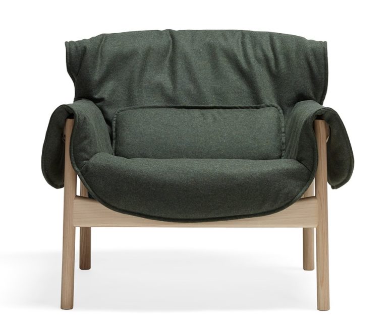 The piece is made of a reclaimed wooden frame and fabric or leather upholstery for a stylish and cozy look