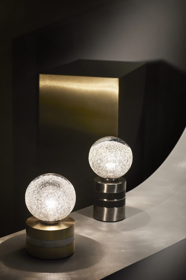 These are bubble table lamps on elegant metal stands, I almost hear this effervescence