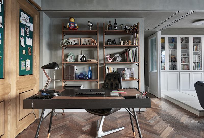 The home office space features some industrial touches and more masculine looks as this is for the husband