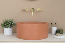 03 This is a rust-colored sink in the round shape and a cool print, it’s a chic idea to add color to your space