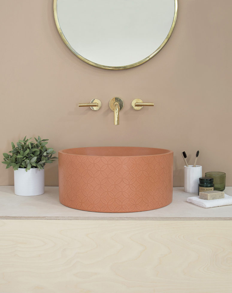 This is a rust-colored sink in the round shape and a cool print, it's a chic idea to add color to your space