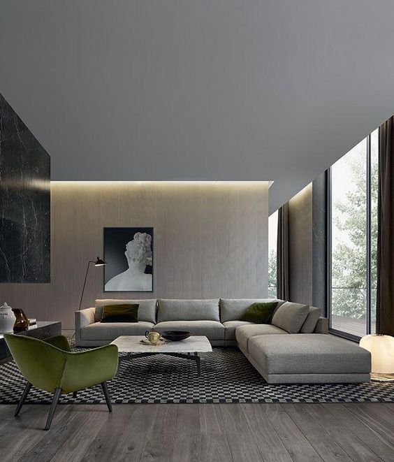 A dove grey L shaped sectional sofa is the base of the room creating the conversation zone