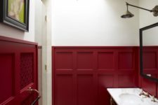 04 an art deco bathroom with burgundy wainscoting that makes a cool bold statement