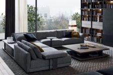 05 a dove grey L-shaped sofa matches the contemporary and edgy room style and makes it look bold