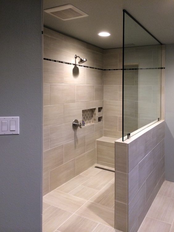 a pony wall with a glass part is ideal to separate the shower and keep all the water inside