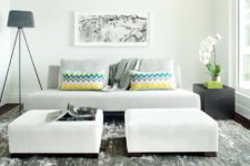 05 large ottomans in a luxurious creamy shade make the space bold and chic
