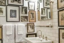 hanging gallery wall in a bathroom
