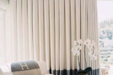 07 inverted pleat curtains with color blocking are sure to add visual interest to the space