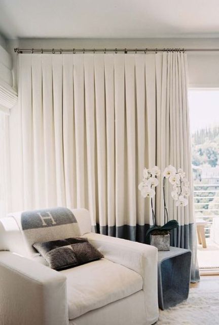 inverted pleat curtains with color blocking are sure to add visual interest to the space