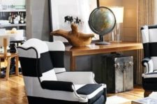 09 a traditional wingback chair in black and white stripes for a vintage and rustic interior