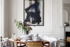 09 a vintage space with a mid-century modern dining set and art