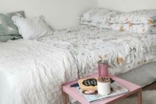 10 a large bed takes the whole space, and a small nightstand is all you need to add