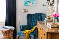 10 a teal tufted velvet chair is a great fit for a modern boho space like this one