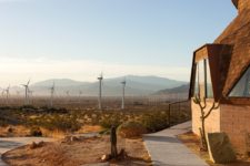 11 The outdoor spaces feature wind turbines and a typical desert landscape