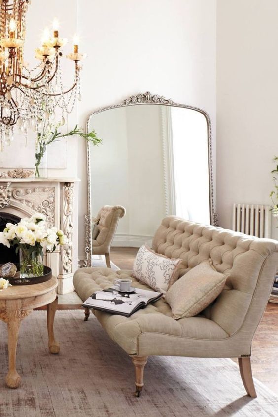 a refined Parisian interior in neutral shades with gilded touches