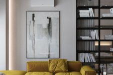 11 a yellow L-shaped sectional sofa adds color to this monochrome space and makes it shine