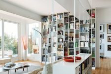 11 an airy metal shelving unit with open and box shelves looks very contemporary